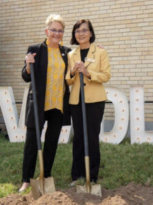 CVM Dean Carolyn Henry and VMDL Director Shuping Zhang celebrate the groundbreaking for the VMDL project.