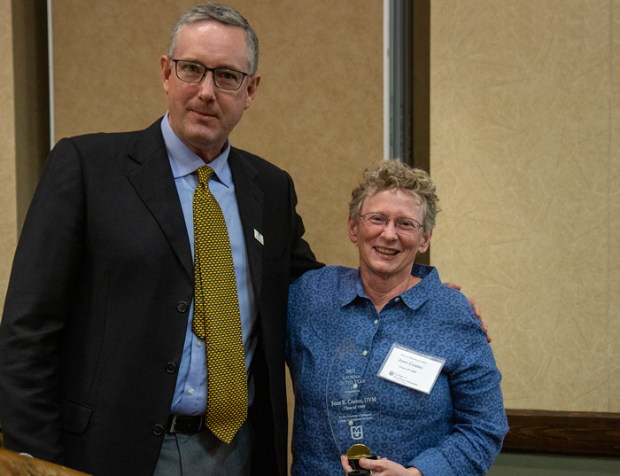 Christian Lorson, the CVM Associate Dean for Research and Graduate Studies and MU Associate Vice Chancellor for Research, served as the emcee for the 2023 Alumni Reunion dinner and presented Professor of Veterinary Neurology and Neurosurgery Joan Coates with the Alumna of the Year Award.