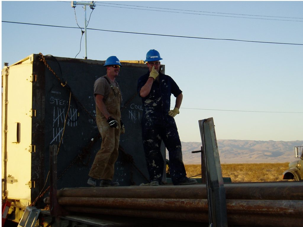 Hansen, right, on deployment to drill water wells in Guatemala.