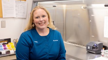 Lauren Delaney sitting down