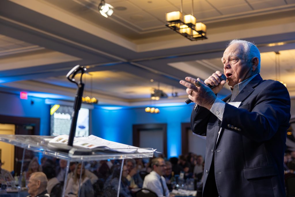 dr. densil adams does the live auction