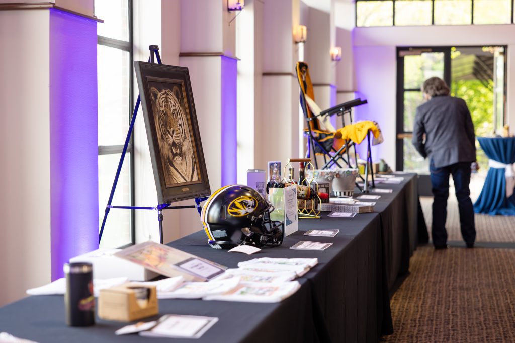 silent auction items fill tables