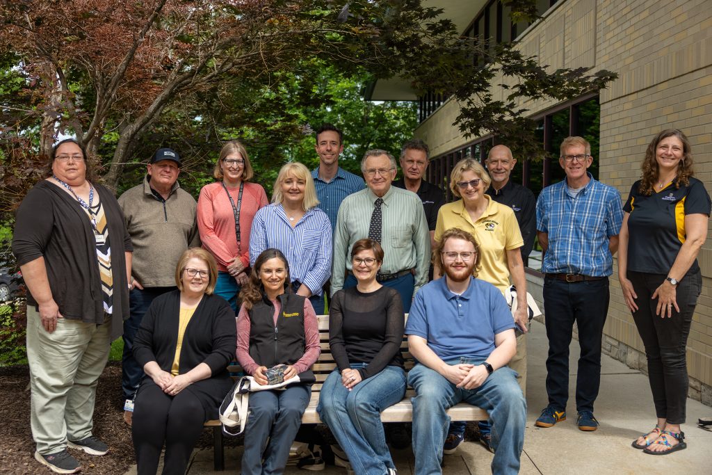 group photo of milestone service honorees