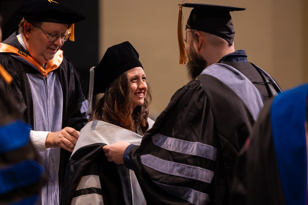 a student gets hooded