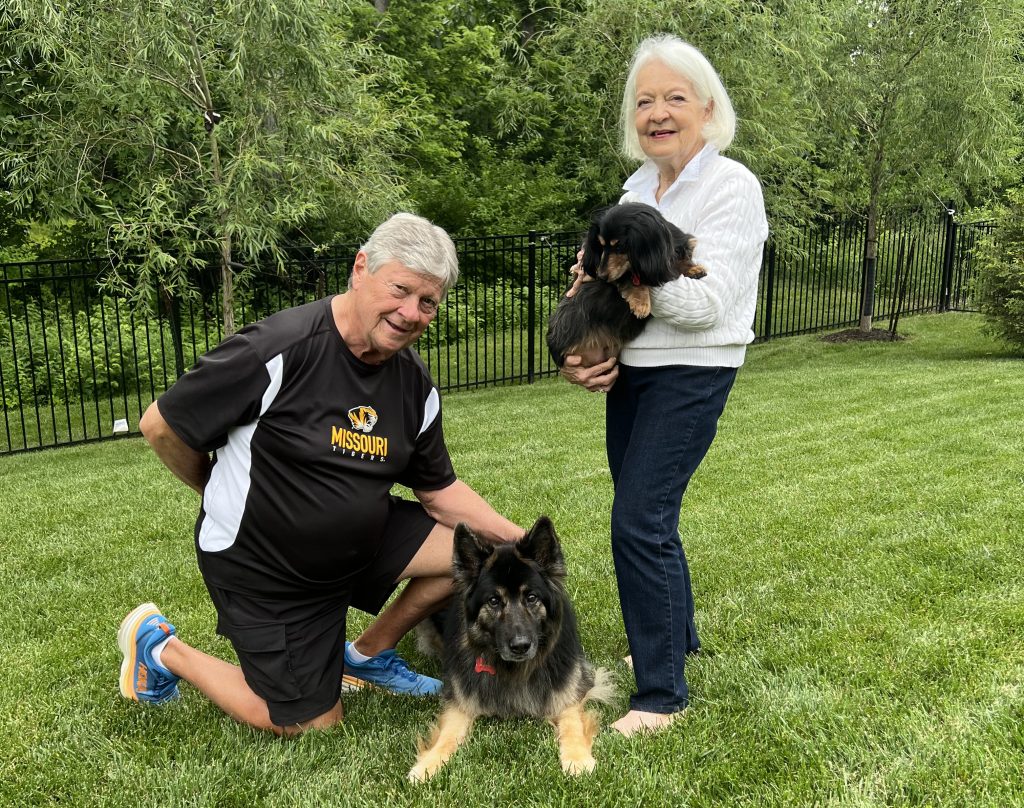 The Sterretts pictured with their dogs Maggie Moo and Frankie Lou.