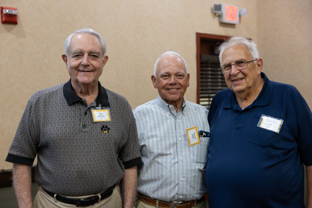 three alumni