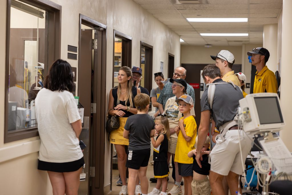 people touring the VHC